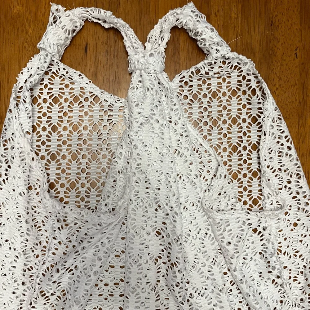 EUC swim coverup with adjustable straps and back. Excellent condition.